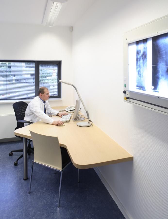 TPK-13, photo: Christoph Edelhoff wooden work table in a doctor's surgery