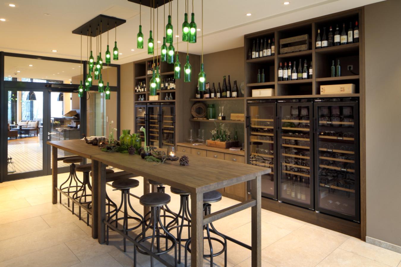 cabinet furniture for wines made of solid dark wood with table made of the same material